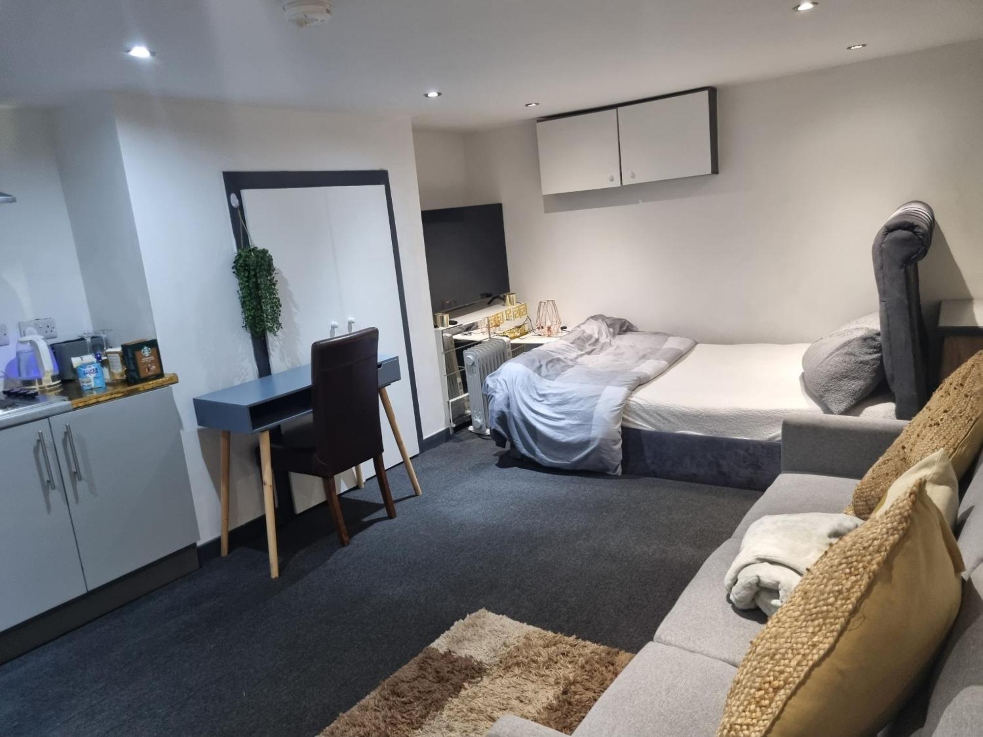 A Cosy Deluxe Size Studio With Queen Size And Sofa Bed Apartment