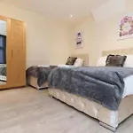 Dior House Apartments