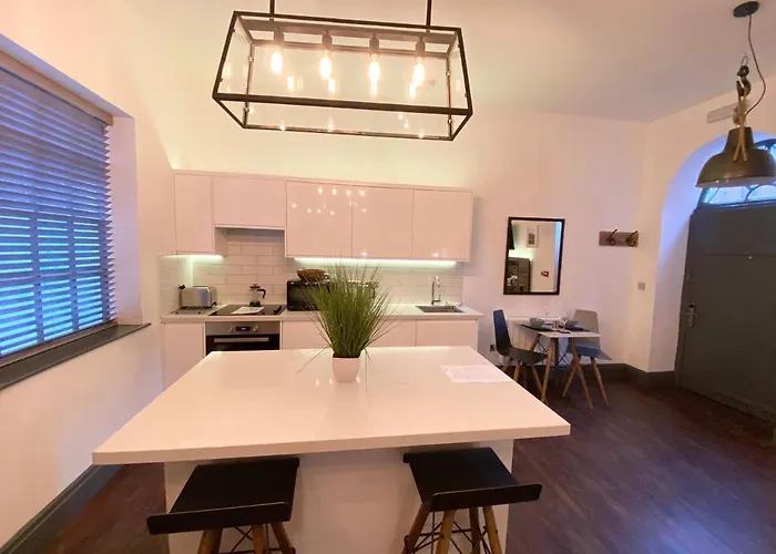 Studio At The Coach House Apartments